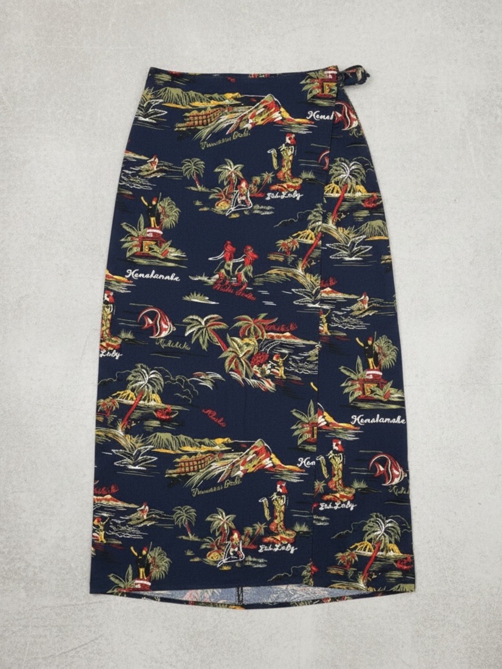 Hilo Hattie Navy Tropical Print Wrap Skirt with Red and Yellow Accents
Size: M